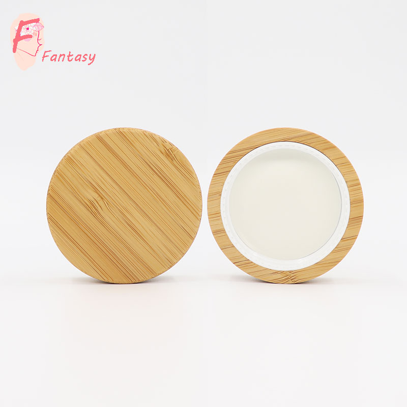 China high end clear frosted glass cream jar container bamboo cap luxury glass jar with wood lid 30ml 50ml 100ml