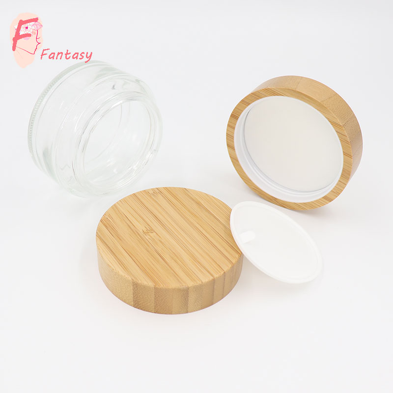 China high end clear frosted glass cream jar container bamboo cap luxury glass jar with wood lid 30ml 50ml 100ml