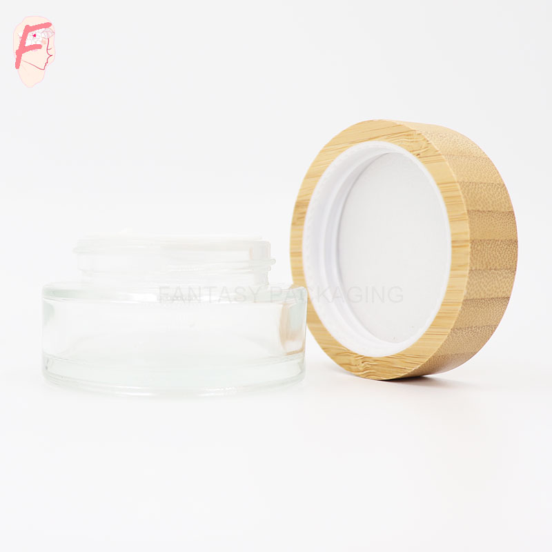China high end clear frosted glass cream jar container bamboo cap luxury glass jar with wood lid 30ml 50ml 100ml