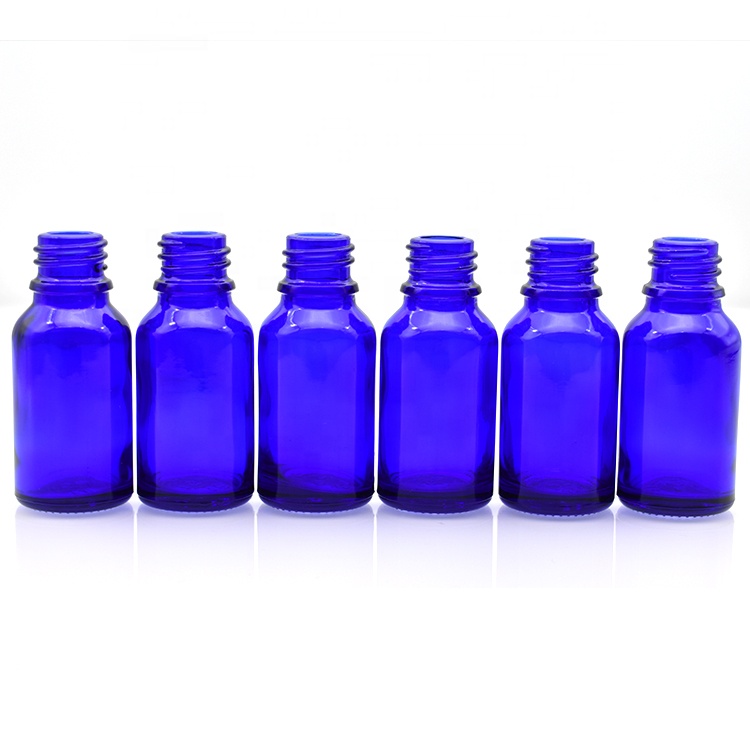 China manufacture 15ml blue glass essential oil bottle with screw cap 5ml 10ml 20ml 30ml 50ml 100ml dropper glass bottle