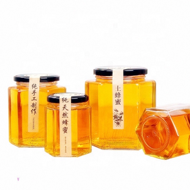 China manufacturers wholesale 500gm  500 ml 730ml 1kg  hexagonal honey glass containers jars with lids