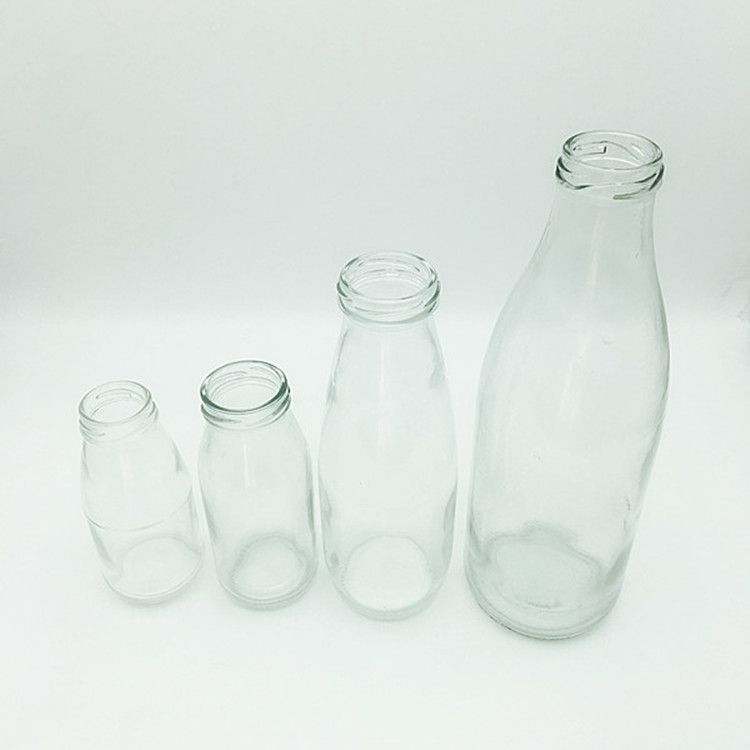 China supplier 200ml 250ml 500ml 1000ml beverage/ juice/ milk glass bottle with metal lids