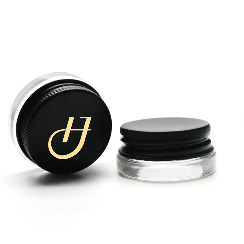 China supplier low profile 7g glass jar with hot stamping gold logo black lids for wax