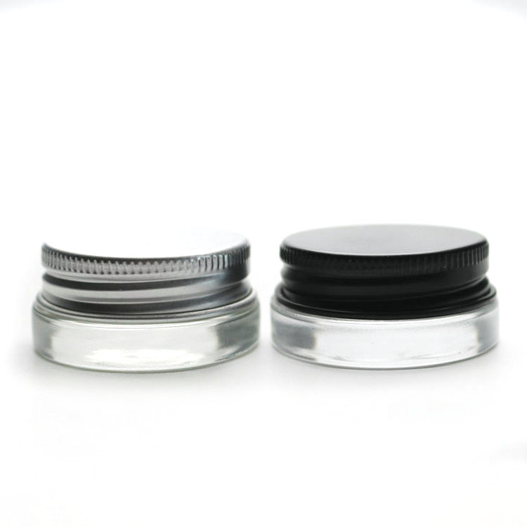 China supplier low profile 7g glass jar with hot stamping gold logo black lids for wax