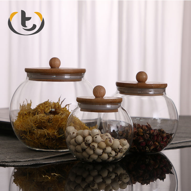 China supply for sale hermetic pumpkin glass jar with lid high borosilicate glass storage jar