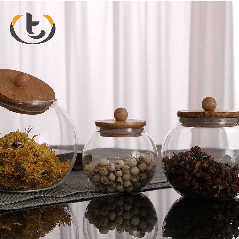 China supply for sale hermetic pumpkin glass jar with lid high borosilicate glass storage jar