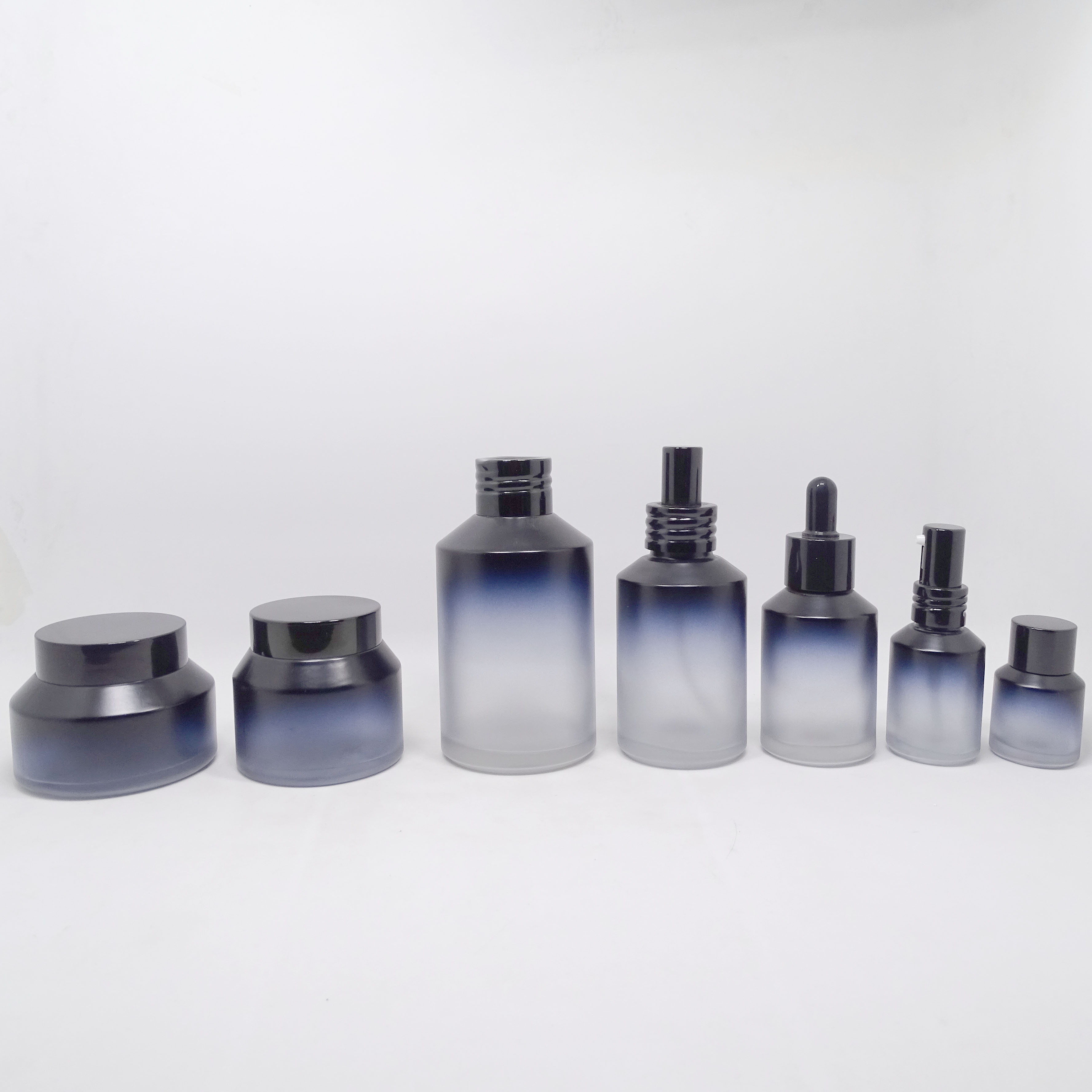 China wholesale hot selling custom colored cosmetic glass dropper lotion bottles and jars