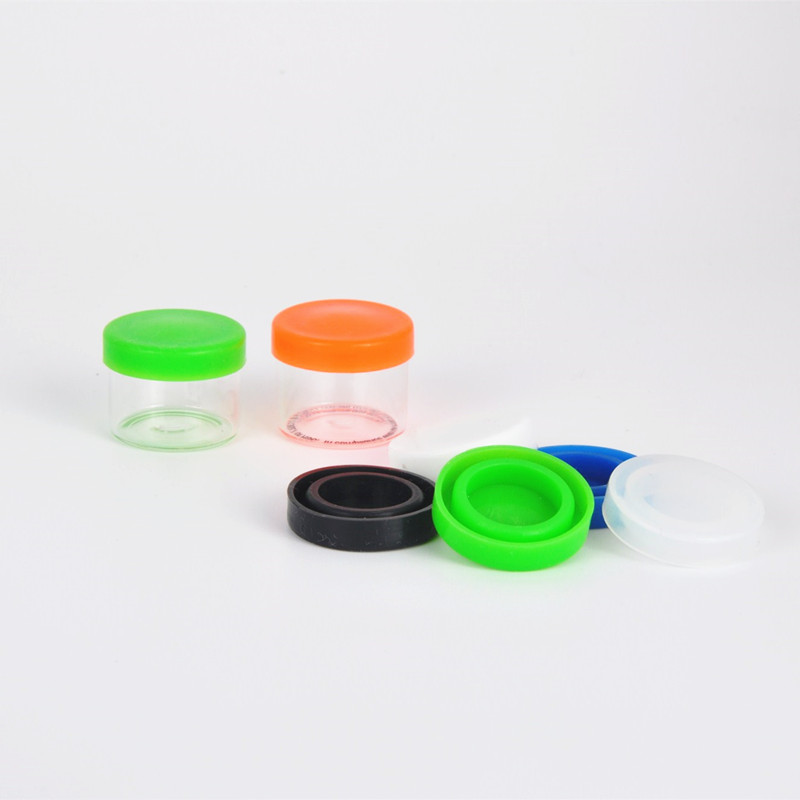 China wholesale price Borosilicate concentrate jars for CBD cream 6ml glass jar concentrate with soft silicone lid