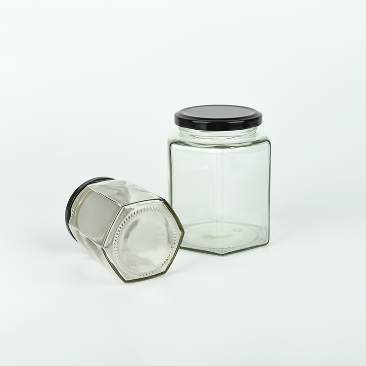 Chinese Manufacturer Customized Size Transparent Glass Honey Jar Jam Bottle With Iron Lid Hexagon Honey Container In Stock