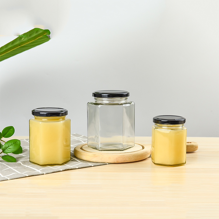 Chinese Manufacturer Customized Size Transparent Glass Honey Jar Jam Bottle With Iron Lid Hexagon Honey Container In Stock