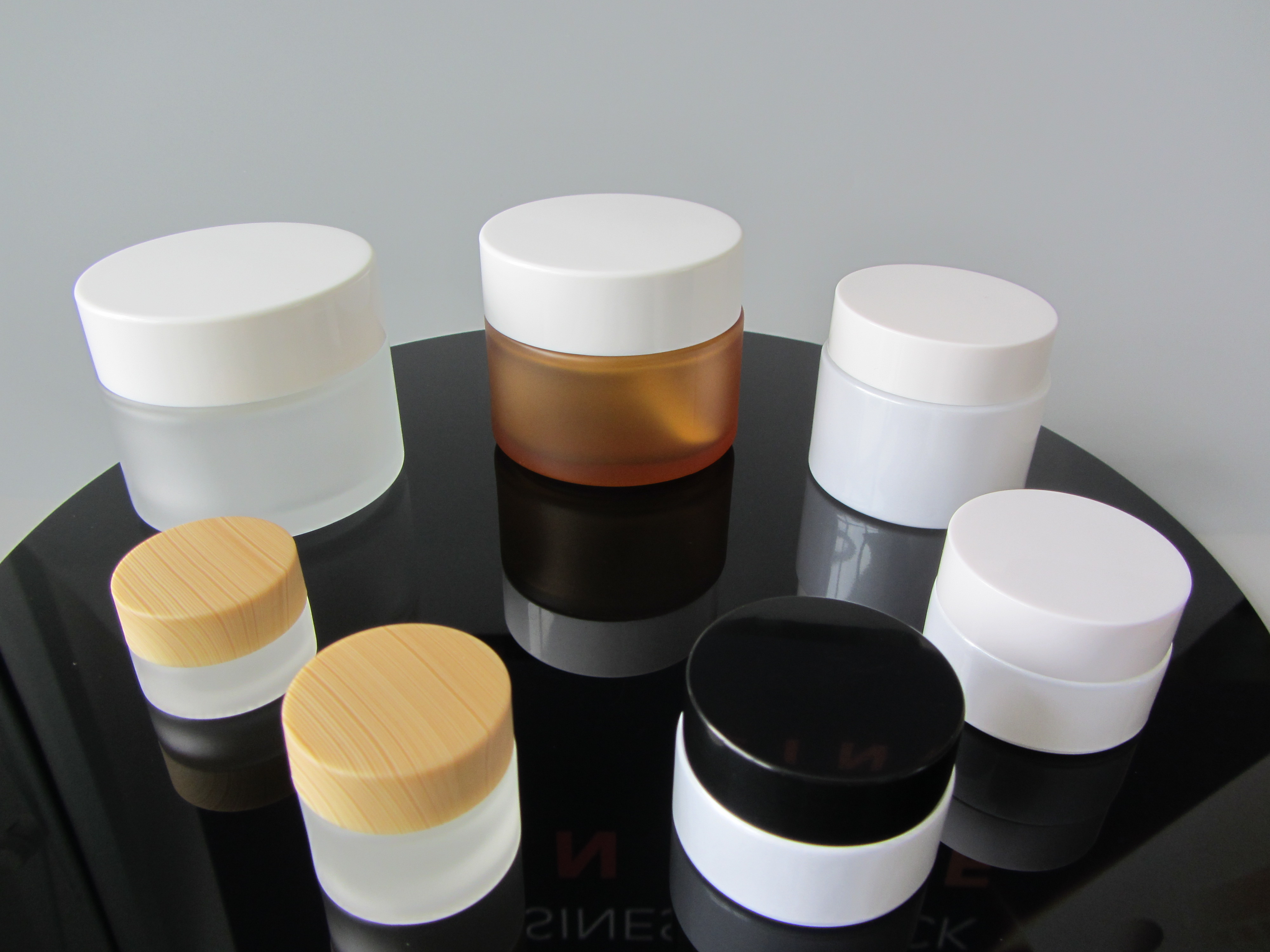 Chinese Supplier 100ml Wide Mouth Custom Amber Cosmetic Containers Body Glass Cream Jar