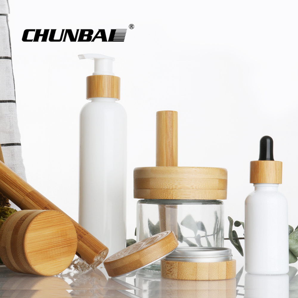 Chunbai 1oz 2oz 3oz 4oz 5oz 6oz CBD glass jar containers bamboo cream jar frosted glass jar with bamboo lid free sample