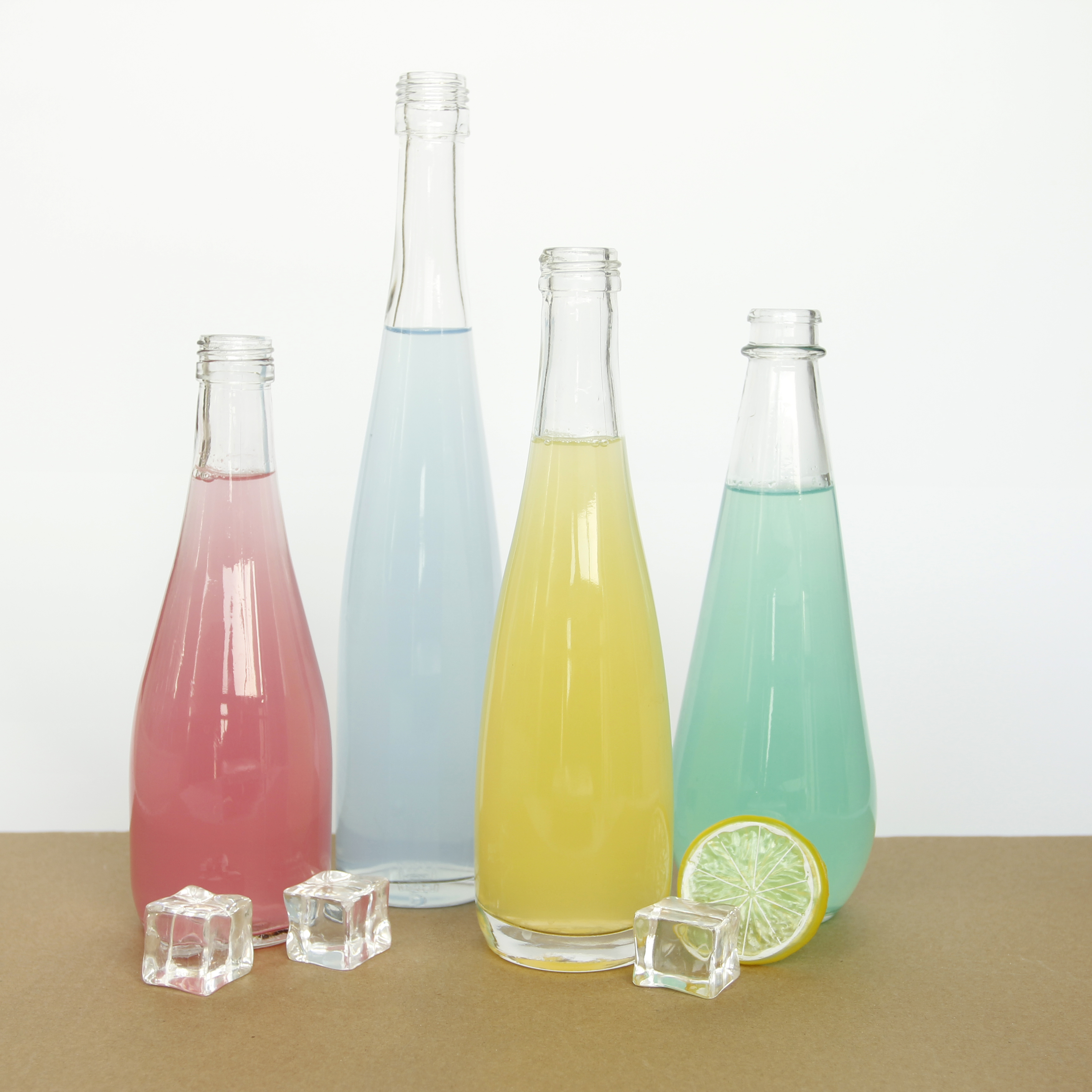 Classic 250ml Water Tear Shape Glass Bottles popular for Juice Drinks Packaging