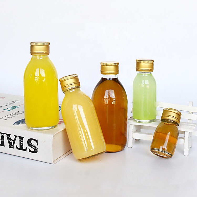 Clear 50ml Glass Small Energy Drink Bottle With Tamper Evident Cap For Juice Detox Shot