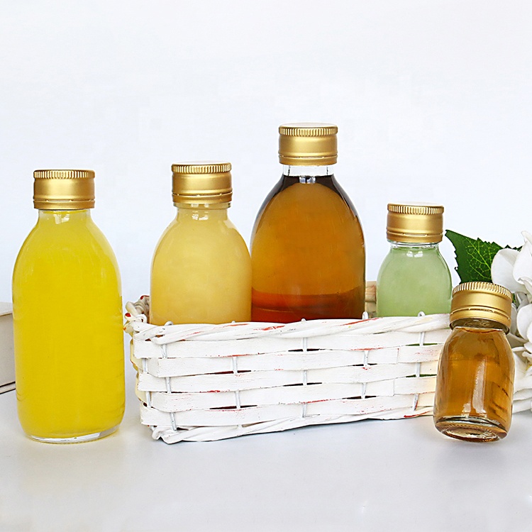 Clear 50ml Glass Small Energy Drink Bottle With Tamper Evident Cap For Juice Detox Shot