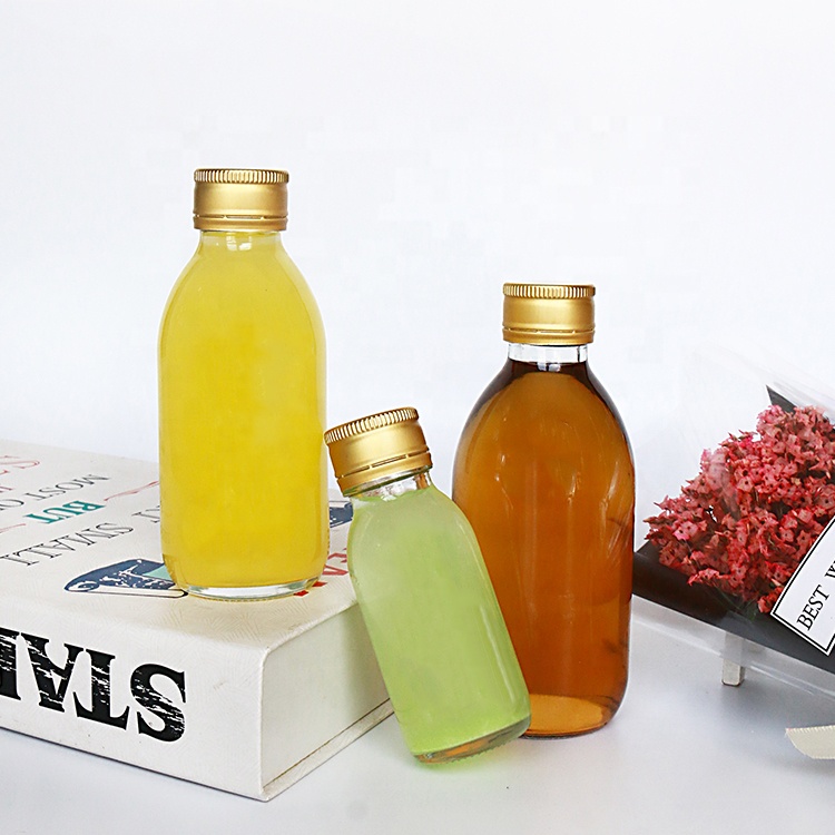 Clear 50ml Glass Small Energy Drink Bottle With Tamper Evident Cap For Juice Detox Shot