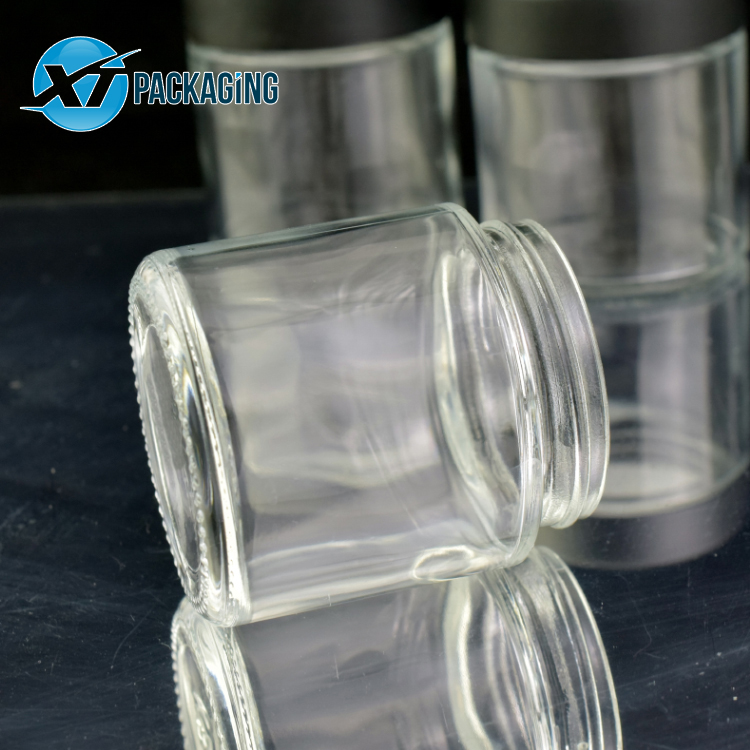 Clear child resistant clear glass cosmetic jar with Child proof lid