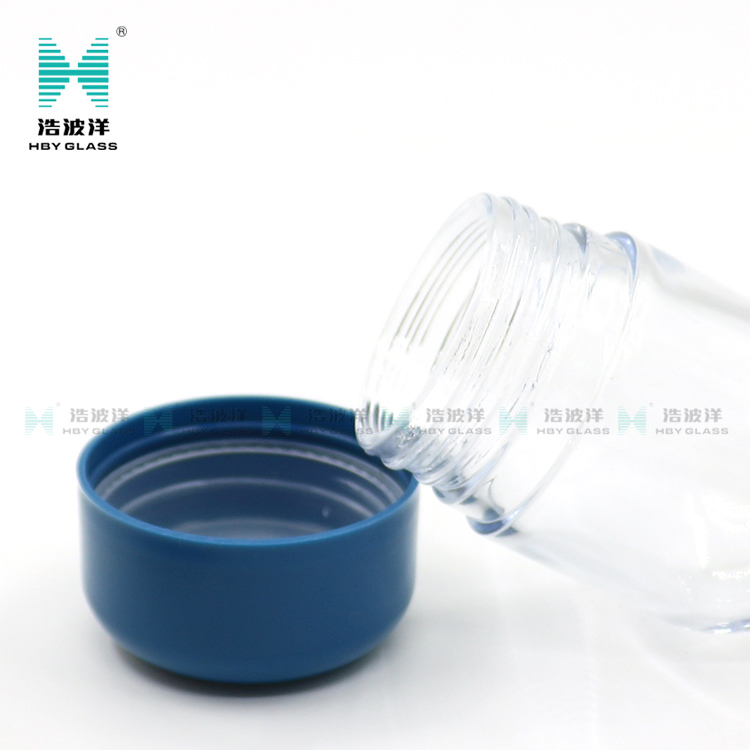 Clear elliptic 90ml cream wax oil glass jar with plastic childproof lid