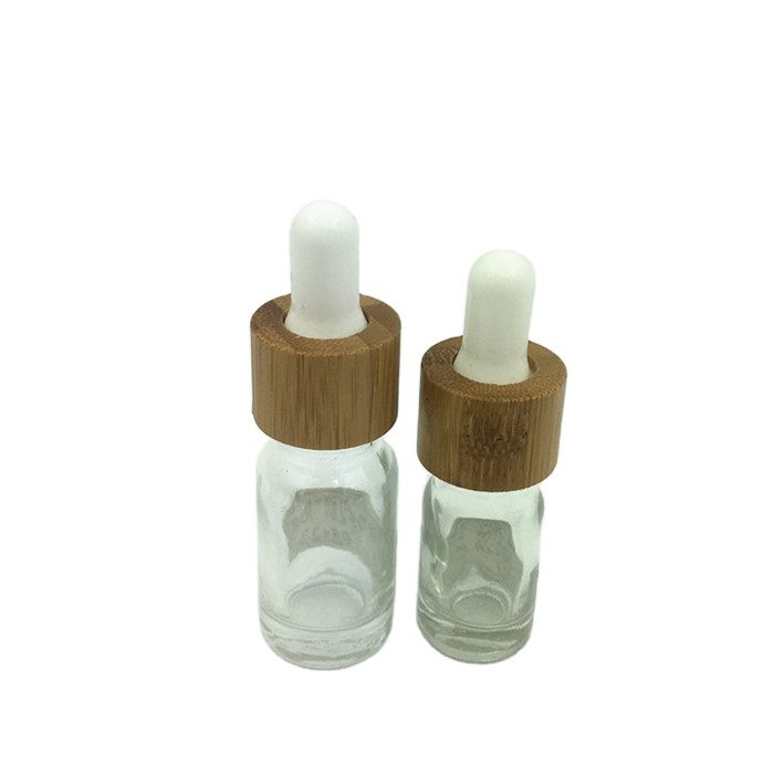 Clear glass bottle with bamboo cap