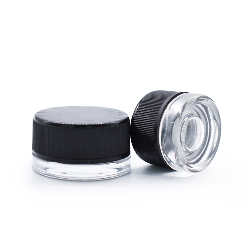 Clear glass jar with black child-proofing cap for Dry Herb Wax Thick Oil Concentrate