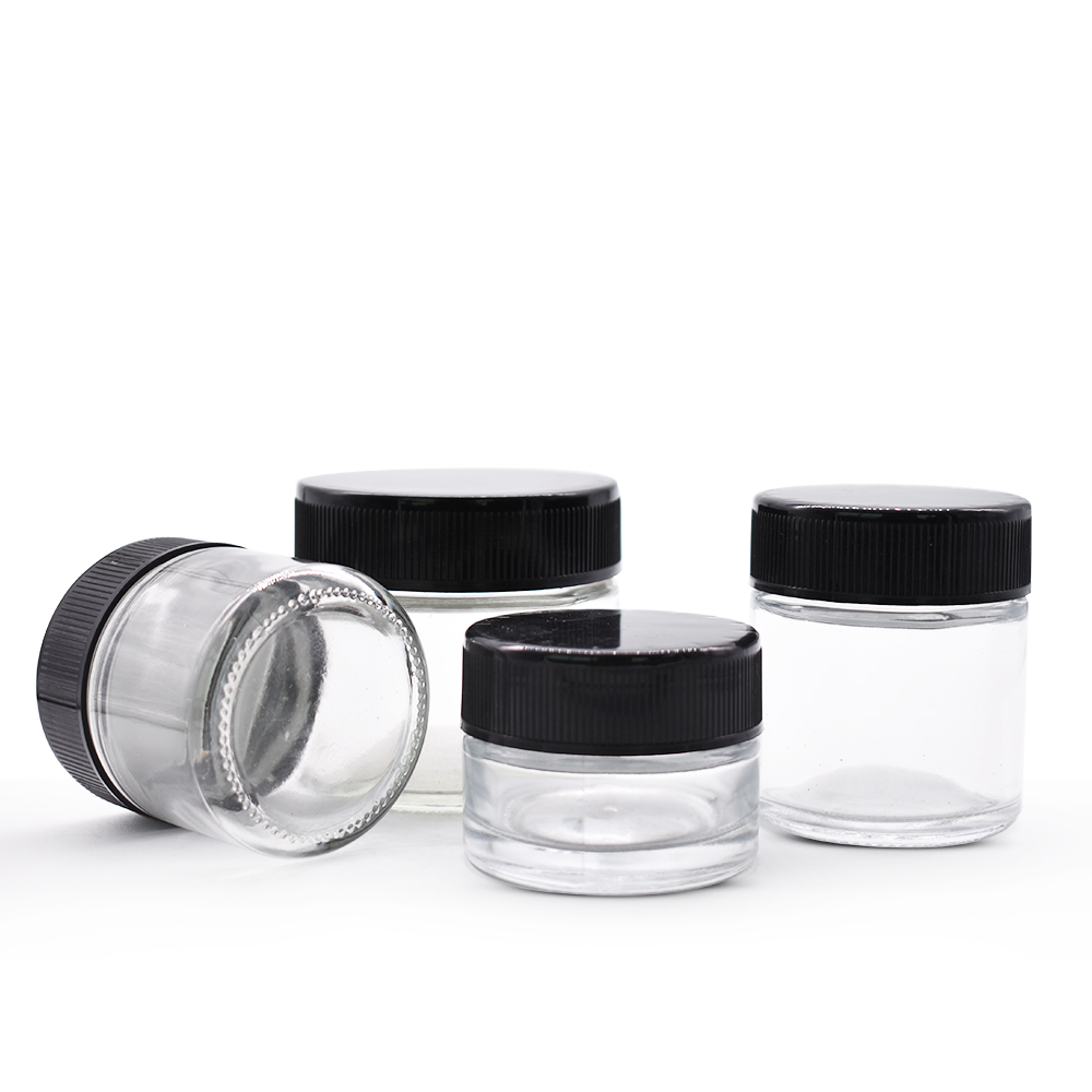 Clear glass jar with black child-proofing cap for Dry Herb Wax Thick Oil Concentrate