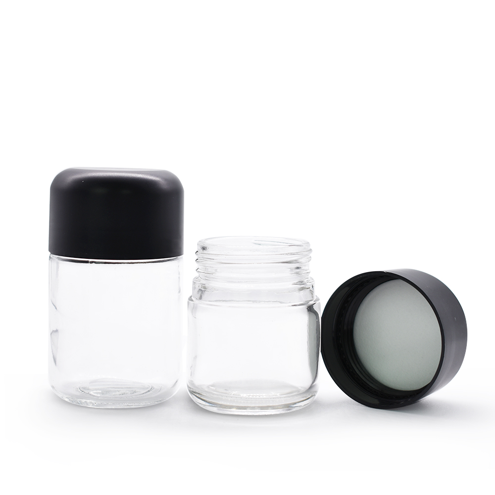 Clear glass jar with black child-proofing cap for Dry Herb Wax Thick Oil Concentrate