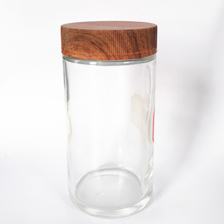 Clear gooq quality child resistant 2OZ glass jar with plastic wooden lid