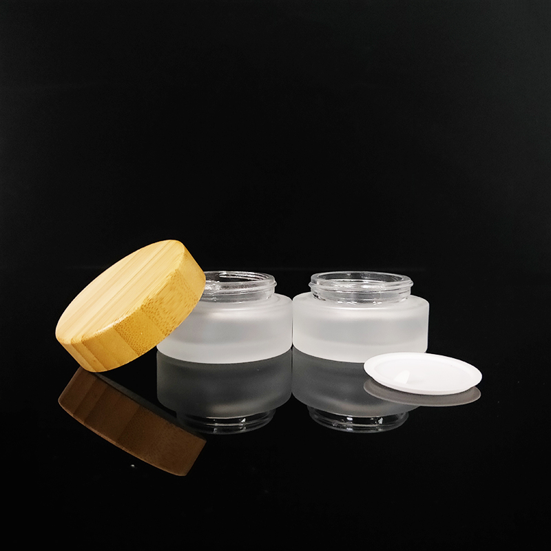 Clear personal care 10g 30g 50g 100g frosted clear glass cosmetic cream jar with bamboo wooden lid logo engraving