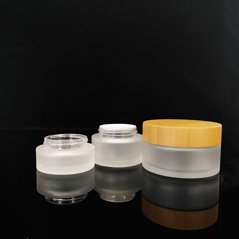 Clear personal care 10g 30g 50g 100g frosted clear glass cosmetic cream jar with bamboo wooden lid logo engraving