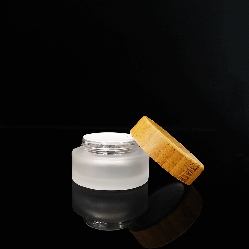 Clear personal care 10g 30g 50g 100g frosted clear glass cosmetic cream jar with bamboo wooden lid logo engraving