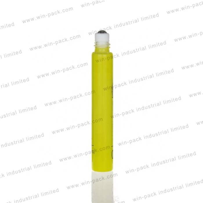 Clear tube glass roll on bottle with silver lid and white ball housing