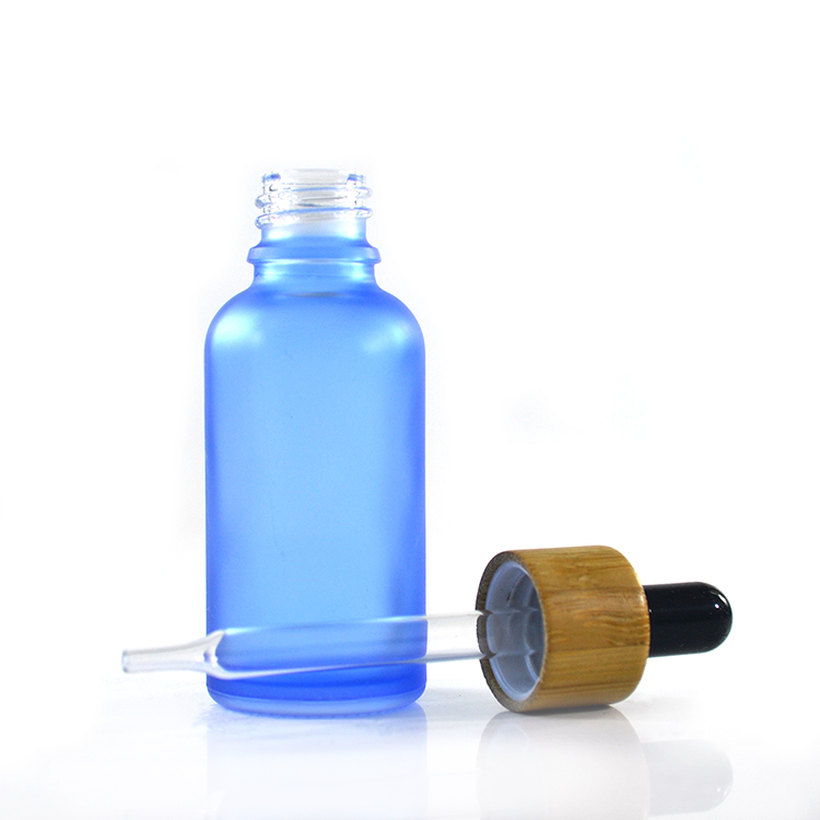 Colorful cosmetic essential oil packaging 30ml clear glass dropper bottle with bamboo cap
