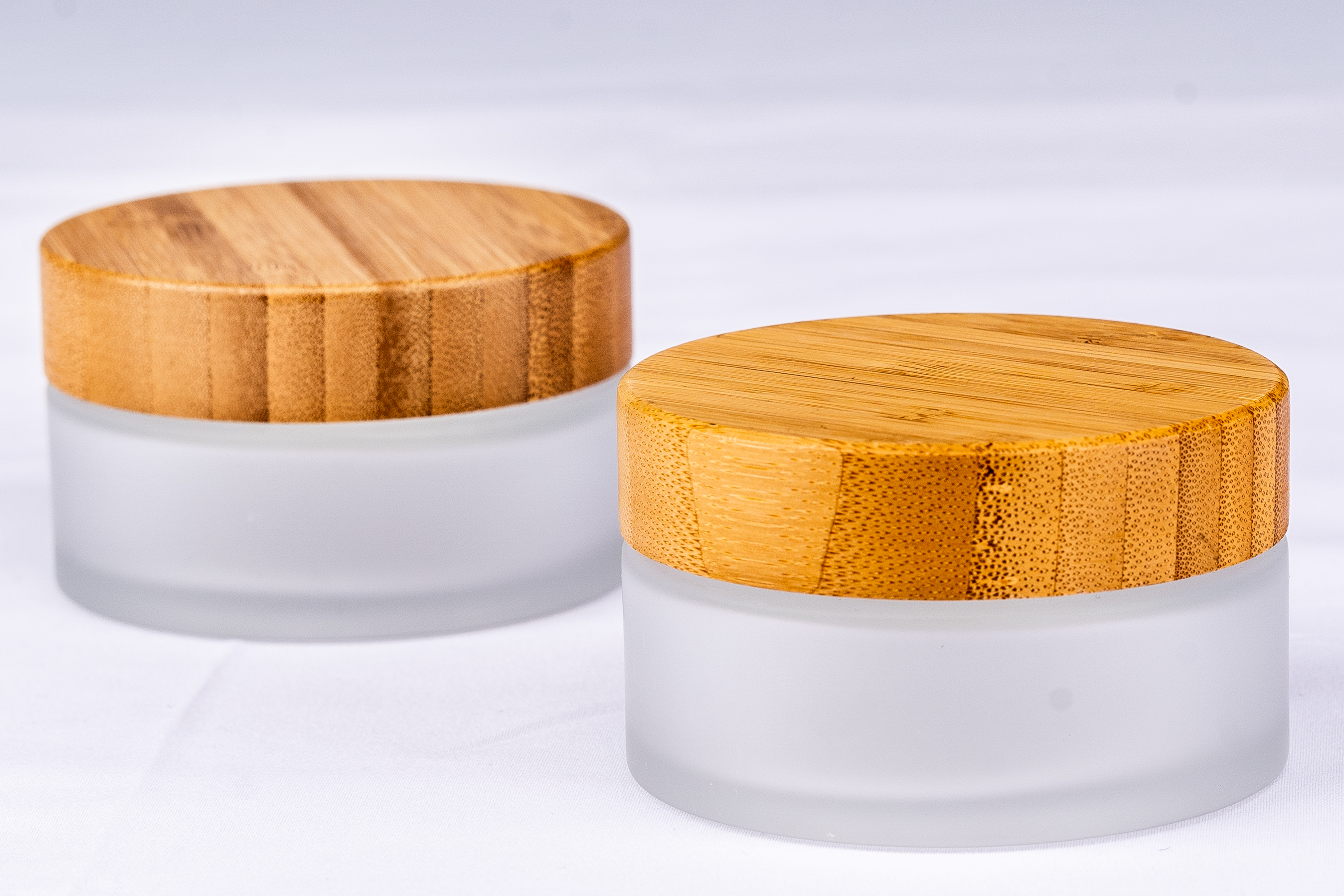 Cosmetic 100g high quality customized bamboo cap frosted glass cream jar
