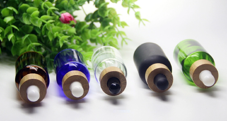 Cosmetic 15ml 20ml essential oil bottle matte black frosted glass bamboo dropper bottle with bamboo cap