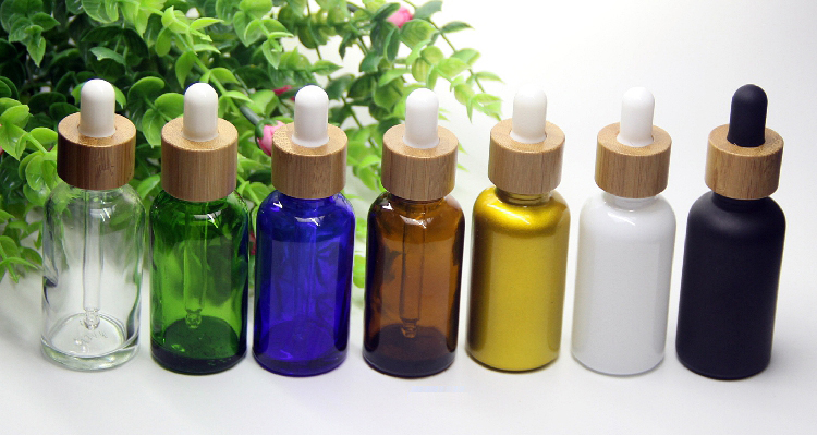 Cosmetic 15ml 20ml essential oil bottle matte black frosted glass bamboo dropper bottle with bamboo cap
