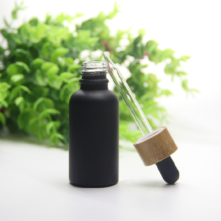 Cosmetic 15ml 20ml essential oil bottle matte black frosted glass bamboo dropper bottle with bamboo cap