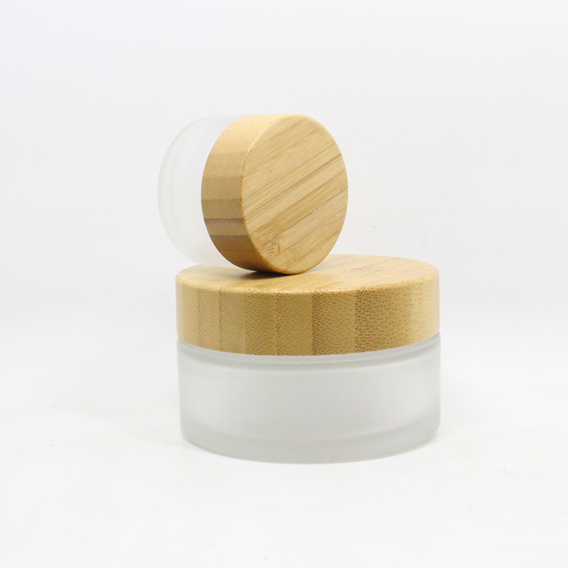 Cosmetic 15ml 30ml 50ml 100ml clear frosted glass jar bamboo lid with plastic gasket bamboo cream jar