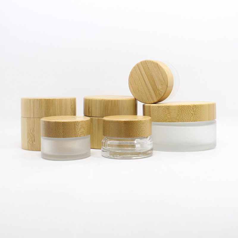 Cosmetic 15ml 30ml 50ml 100ml clear frosted glass jar bamboo lid with plastic gasket bamboo cream jar