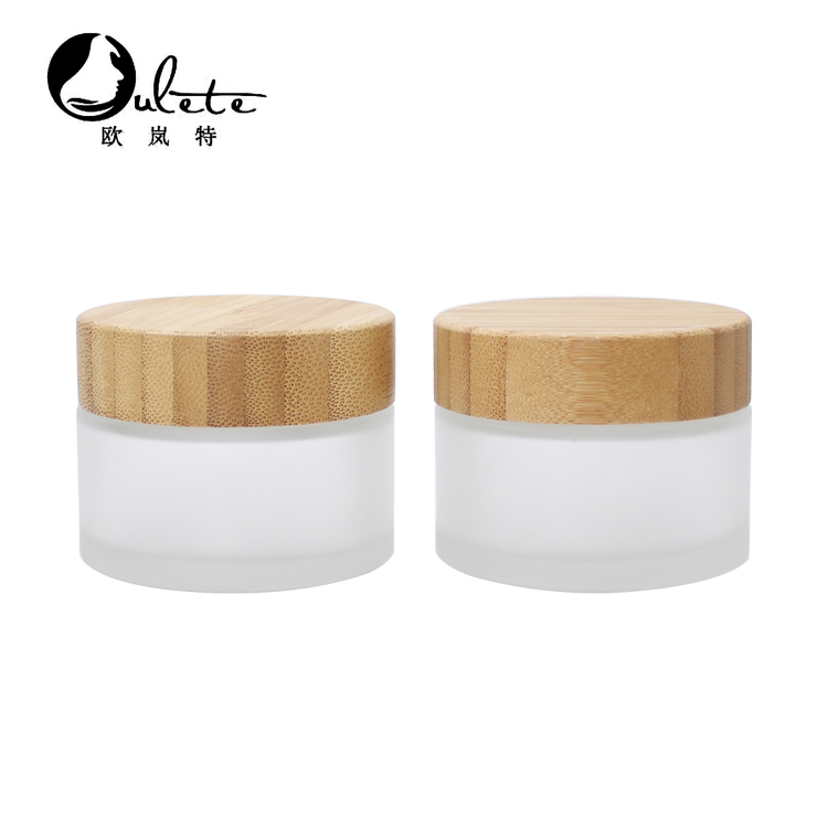 Cosmetic 15ml 30ml 50ml 100ml clear frosted glass jar with bamboo wood lid for body cream
