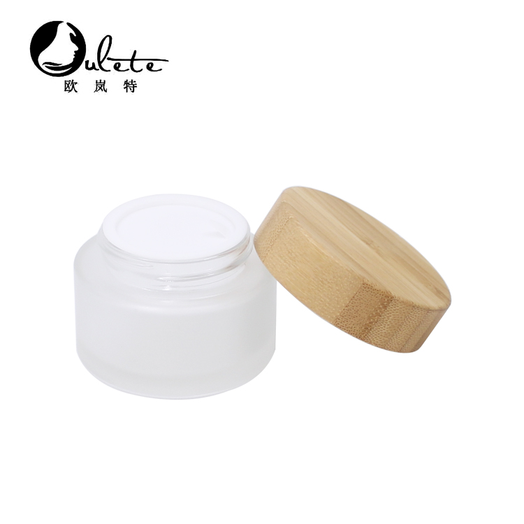 Cosmetic 15ml 30ml 50ml 100ml clear frosted glass jar with bamboo wood lid for body cream