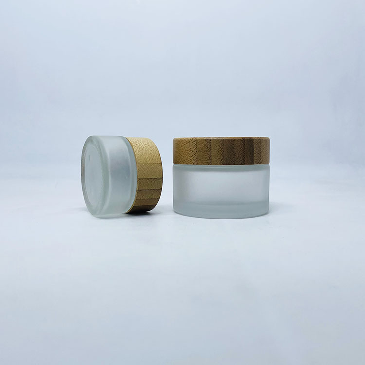 Cosmetic 30g 50g 100g clear frosted glass face cream jar with bamboo cap