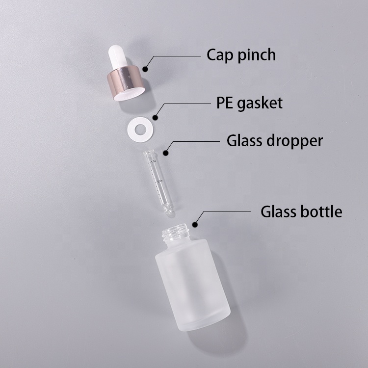 Cosmetic 30ml 40ml 50ml clear frosted flat shoulder essential oil glass bottle with rose gold dropper lid