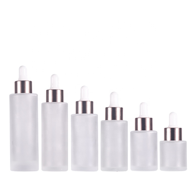 Cosmetic 30ml 40ml 50ml clear frosted flat shoulder essential oil glass bottle with rose gold dropper lid