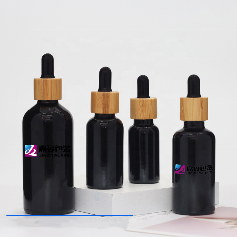 Cosmetic 30ml 50ml 100ml clear frosted glass jar with bamboo wood lid for body cream