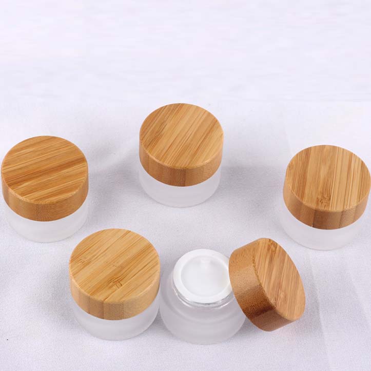 Cosmetic 5ml 15ml 30ml 50ml 100ml clear frosted glass jar with bamboo wood lid for body cream