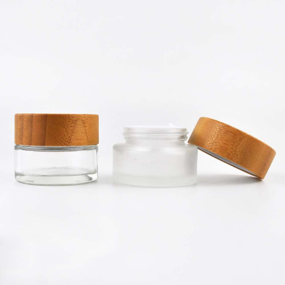 Cosmetic 5ml 15ml 30ml 50ml 100ml clear frosted glass jar with bamboo wood lid for body cream