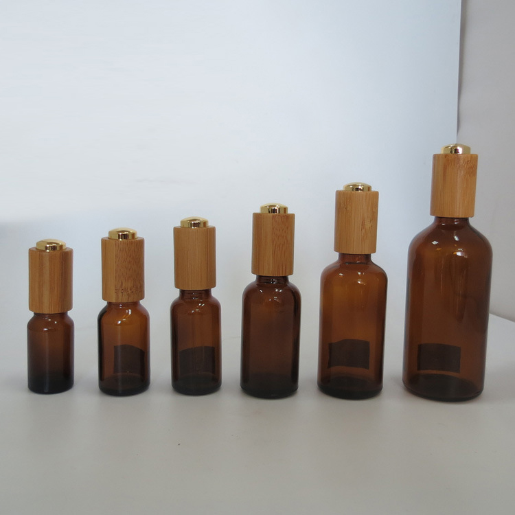 Cosmetic Packaging Skincare 50ml 30ml 100ml Essential Oil Black Amber Glass bottles with Bamboo Press Caps