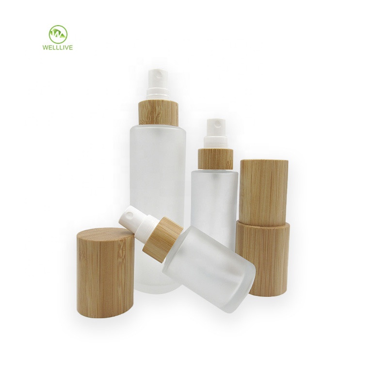Cosmetic bamboo serum packaging 50ml 60ml 2oz glass frosted clear perfume pump sprayer bottle with atomizer