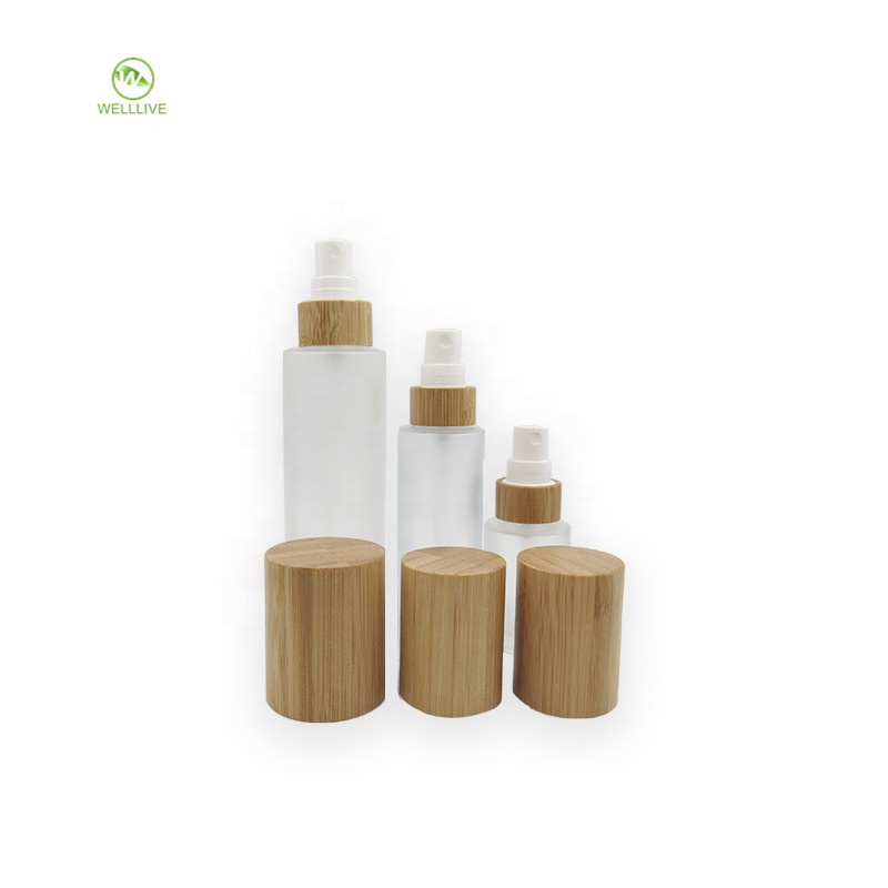 Cosmetic bamboo serum packaging 50ml 60ml 2oz glass frosted clear perfume pump sprayer bottle with atomizer