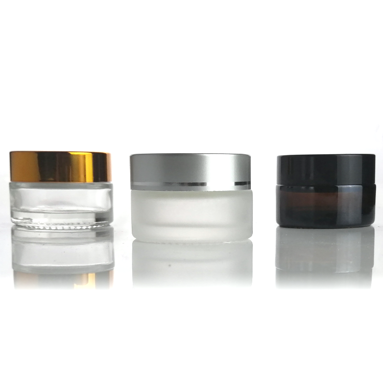 Cosmetic clear cream jars 5g 10g 15g 20g 30g 50g 100g 1oz 2oz amber glass jar with gold silver black cap